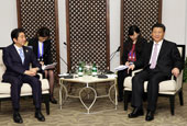 习近平应约晤安倍