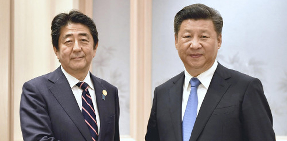 习总嘱安倍南海谨言慎行：避免干扰改善关系