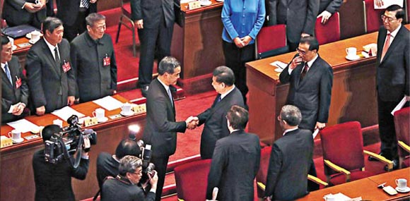 习近平亲切勉励梁振英为国为港做好服务