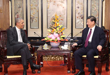 习近平会见美国前总统奥巴马