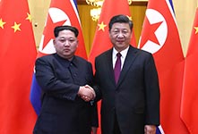 习近平同金正恩举行会谈